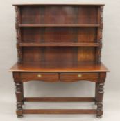 A 19th century fruitwood and mahogany dresser. 129 cm wide x 156 cm high.