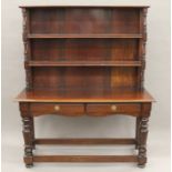 A 19th century fruitwood and mahogany dresser. 129 cm wide x 156 cm high.