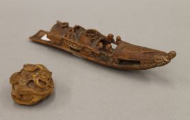 A 19th century Chinese carving of a boat and a carving of a dragon. The former 24 cm long.