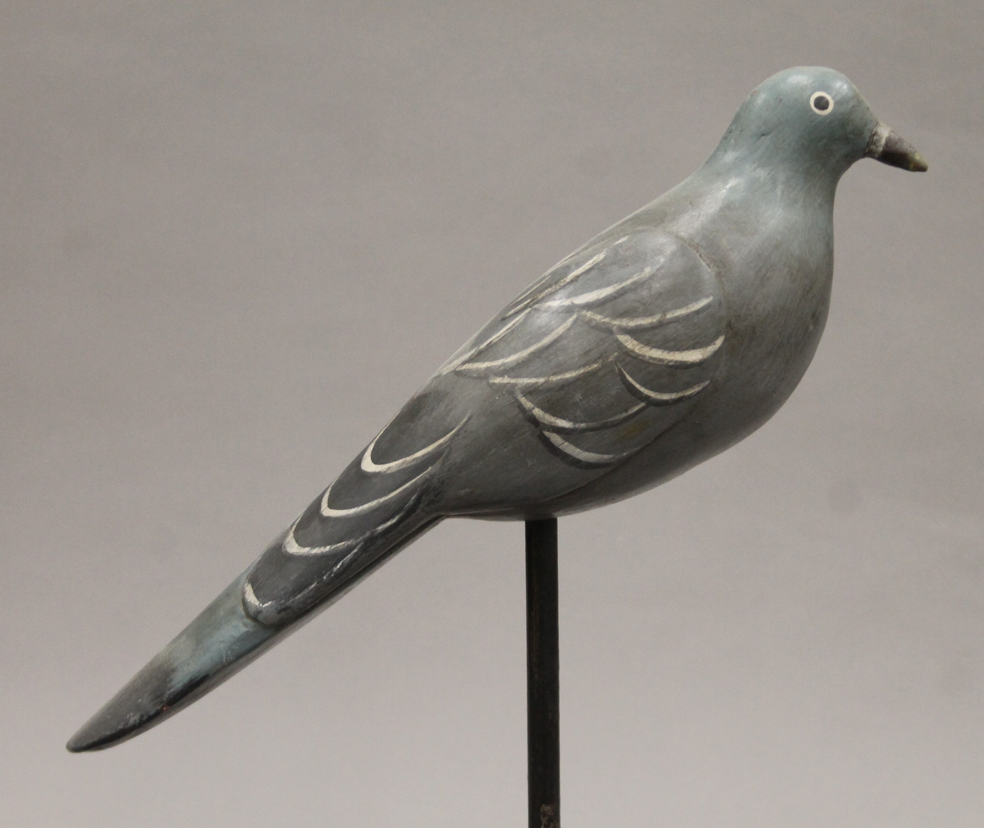 A vintage painted carved wooden pigeon decoy on stand. 35 cm long. - Image 3 of 4