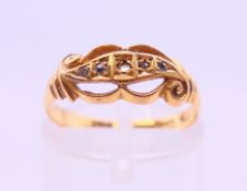 A Victorian 18 ct rose gold and diamond ring. Ring size M.