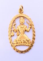 An Asprey 9 ct gold deity/god pendant 5.2 grammes. 4.5 cm high.