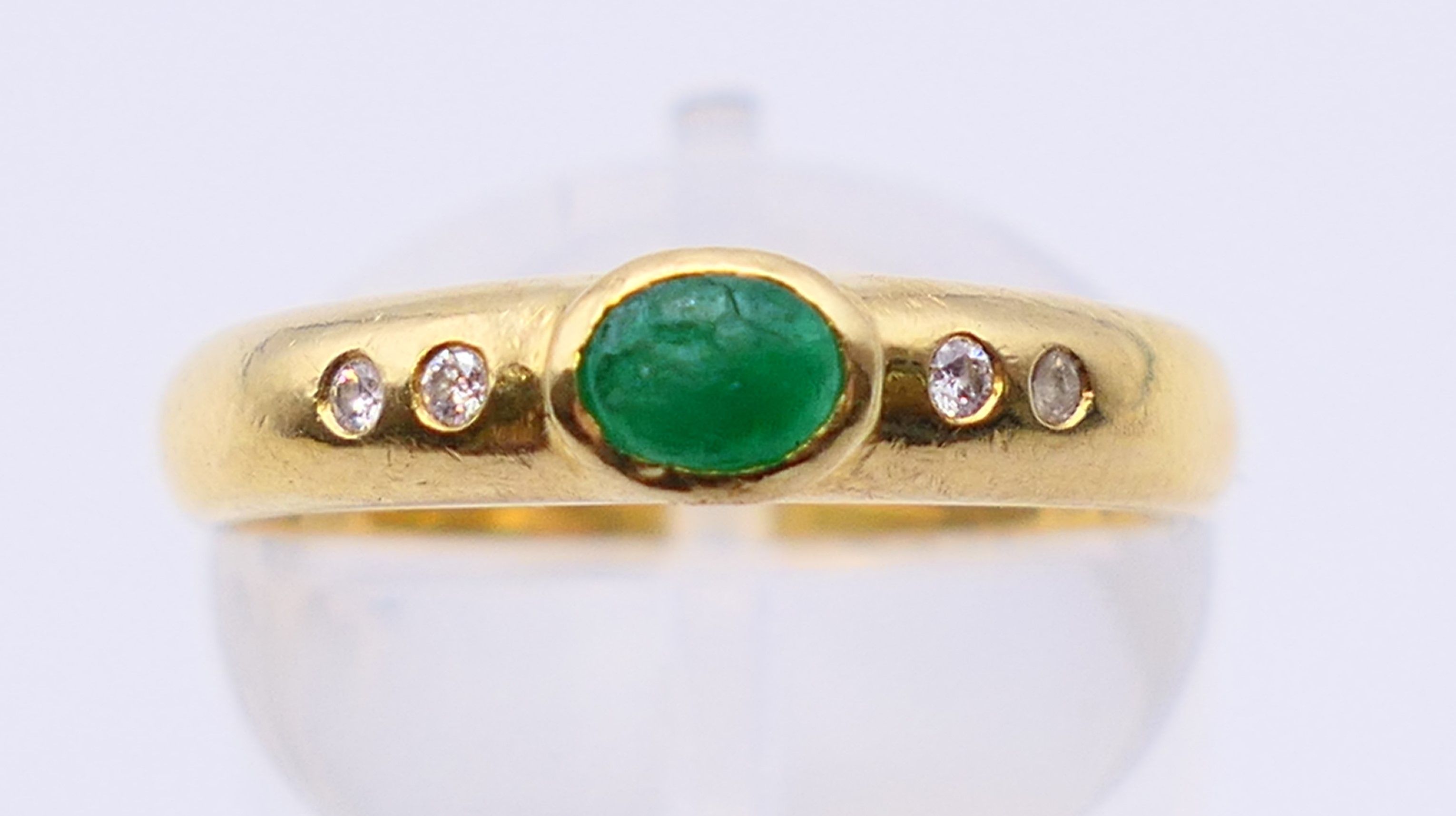 An 18 ct gold, emerald and diamond five-stone ring. Ring size M/N. - Image 2 of 7