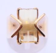 A 1970s 9 ct gold ring set with A barrel of citrine. Ring size M/N.