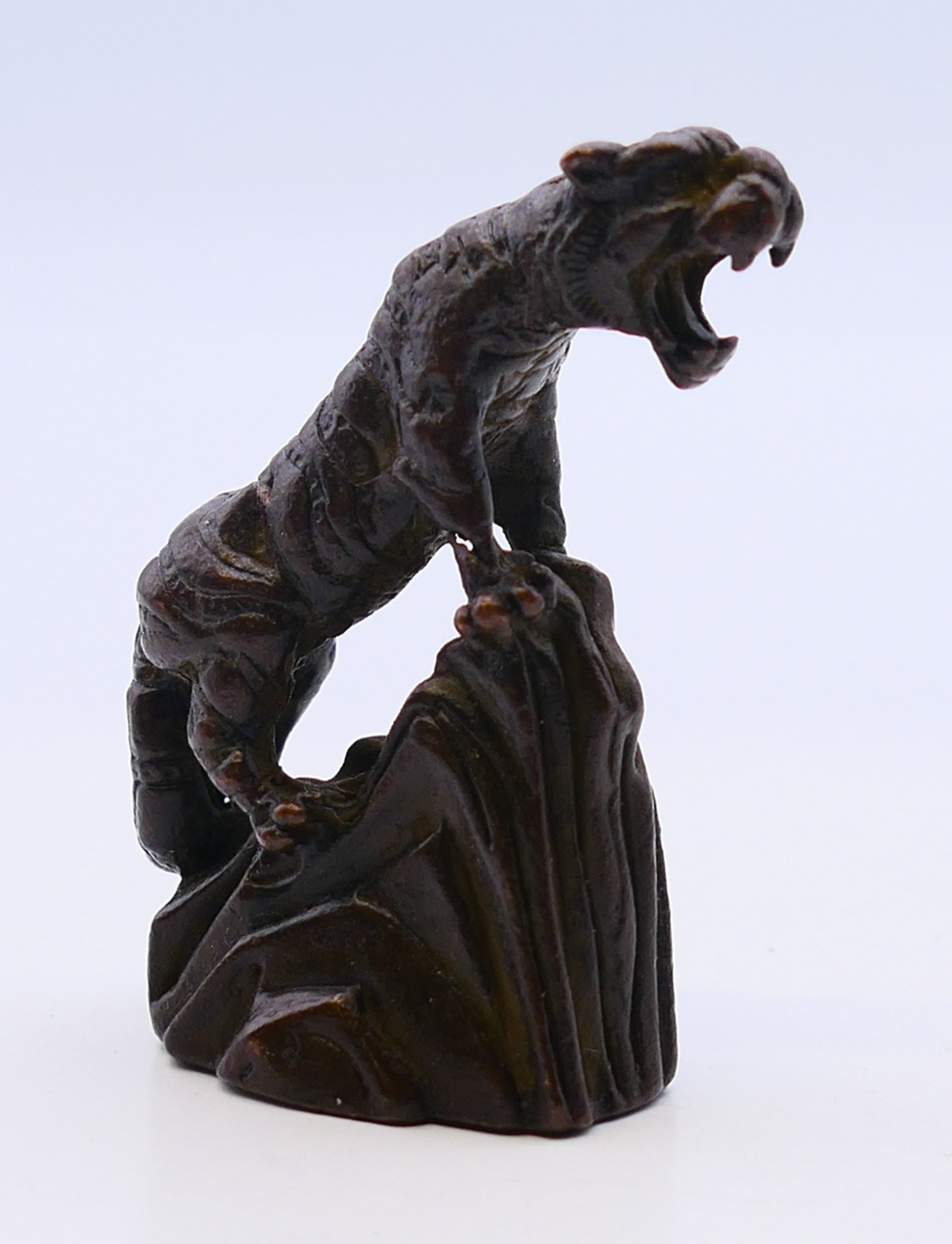 A bronze tiger standing on a rocky outcrop. 5 cm high. - Image 2 of 5