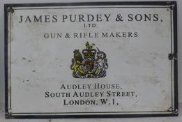 An enamel Purdey sign. 38 cm x 25.5 cm.