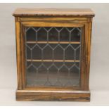 A Victorian coromandel pier cabinet. 79 cm wide.