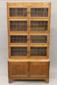 A five-stack lead-glazed oak Minty bookcase. 89 cm wide x 174 cm high x 37.5 cm deep.