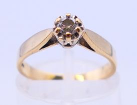 A 9 ct gold diamond solitaire ring. Ring size K.