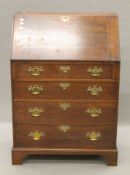 An early 20th century oak bureau. 73 cm wide.