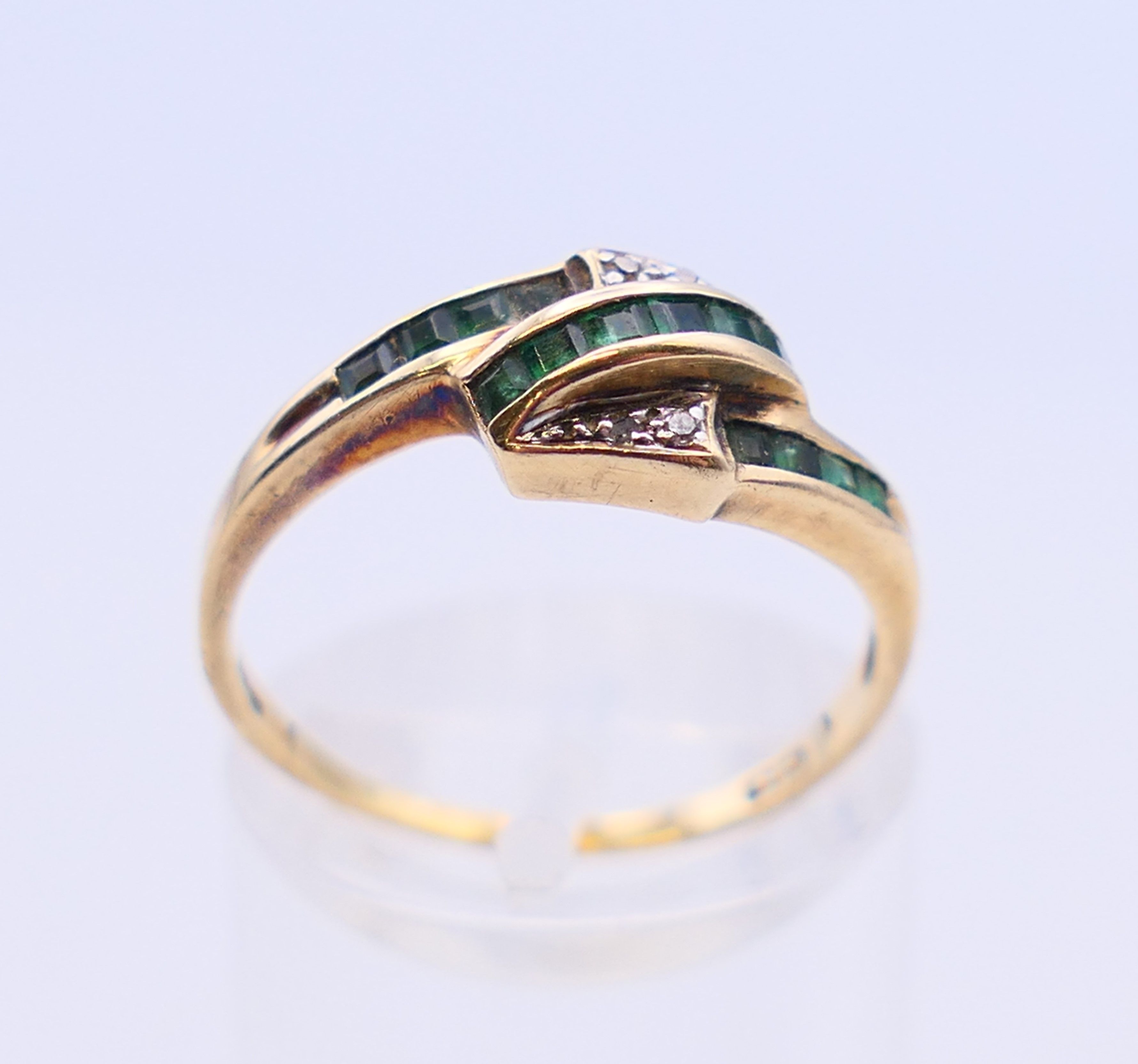 Three various gold, diamond, sapphire and emerald set rings. 4.5 grammes total weight. - Image 15 of 20