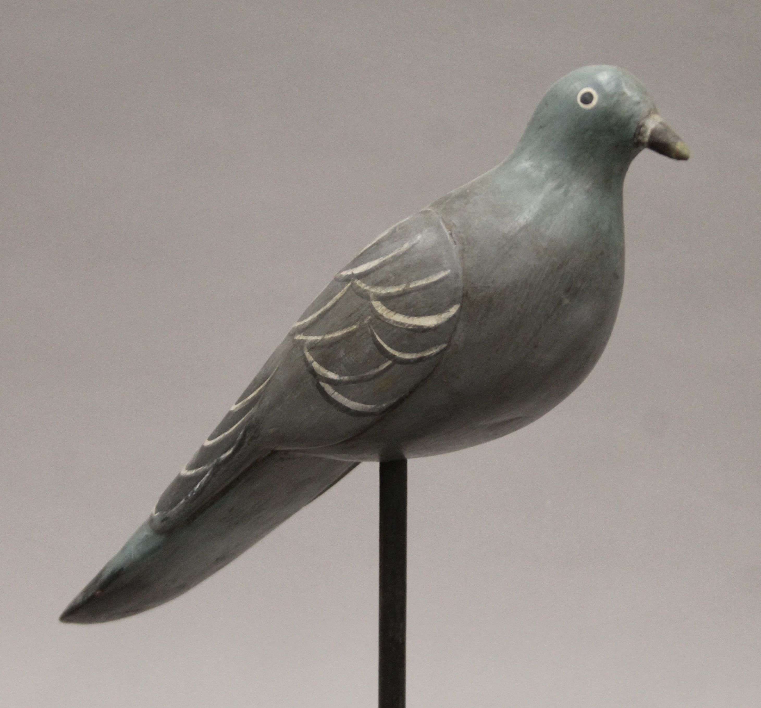 A vintage painted carved wooden pigeon decoy on stand. 35 cm long. - Image 2 of 4