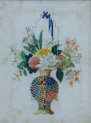 A pair of 19th century Chinese rice paper paintings each depicting a flowering basket and each in