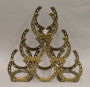 A horseshoe wine rack. 40 cm high.