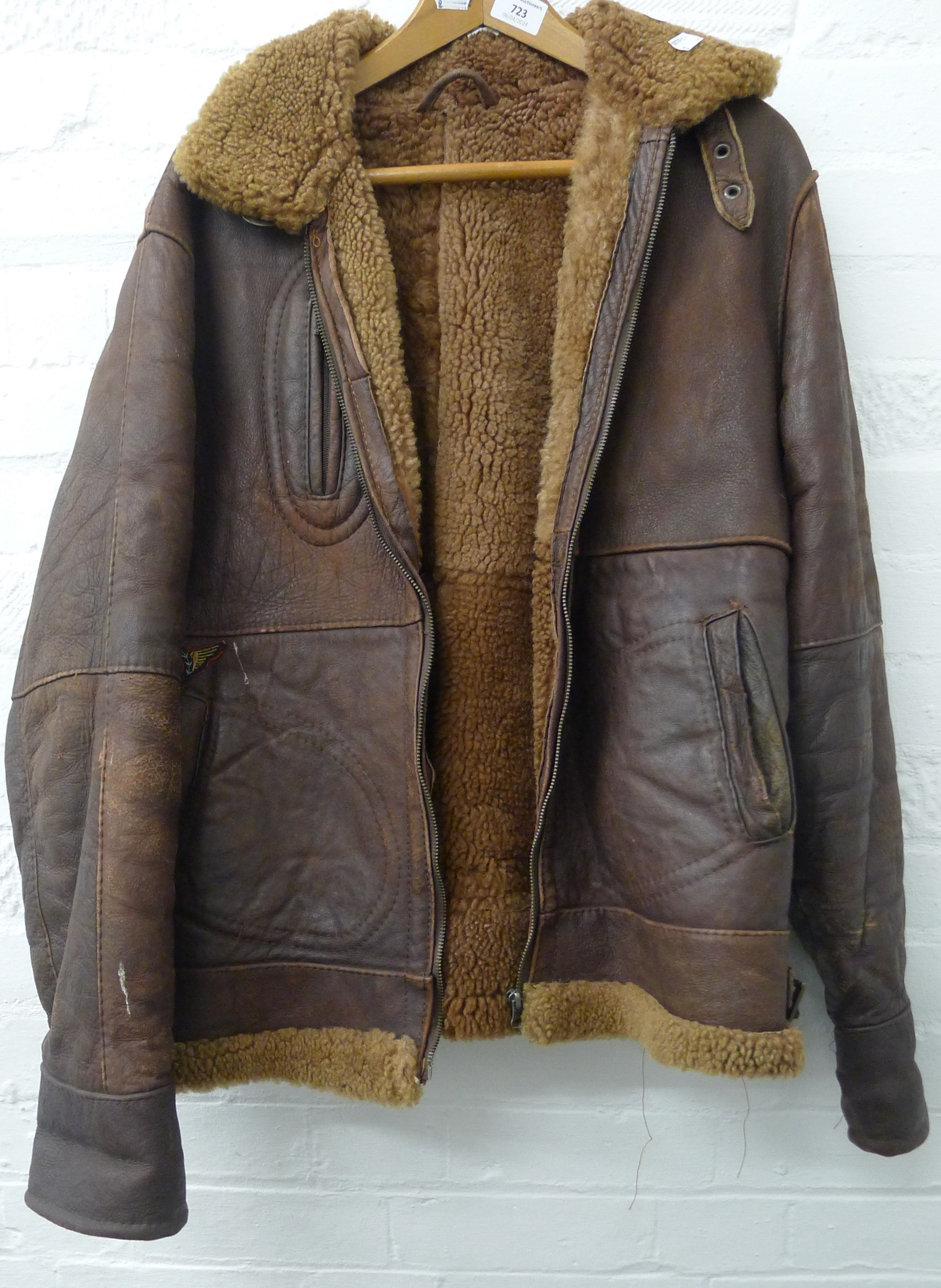 A vintage leather flying jacket labelled Echtes Leader, Made in Italy, size label for XXL.