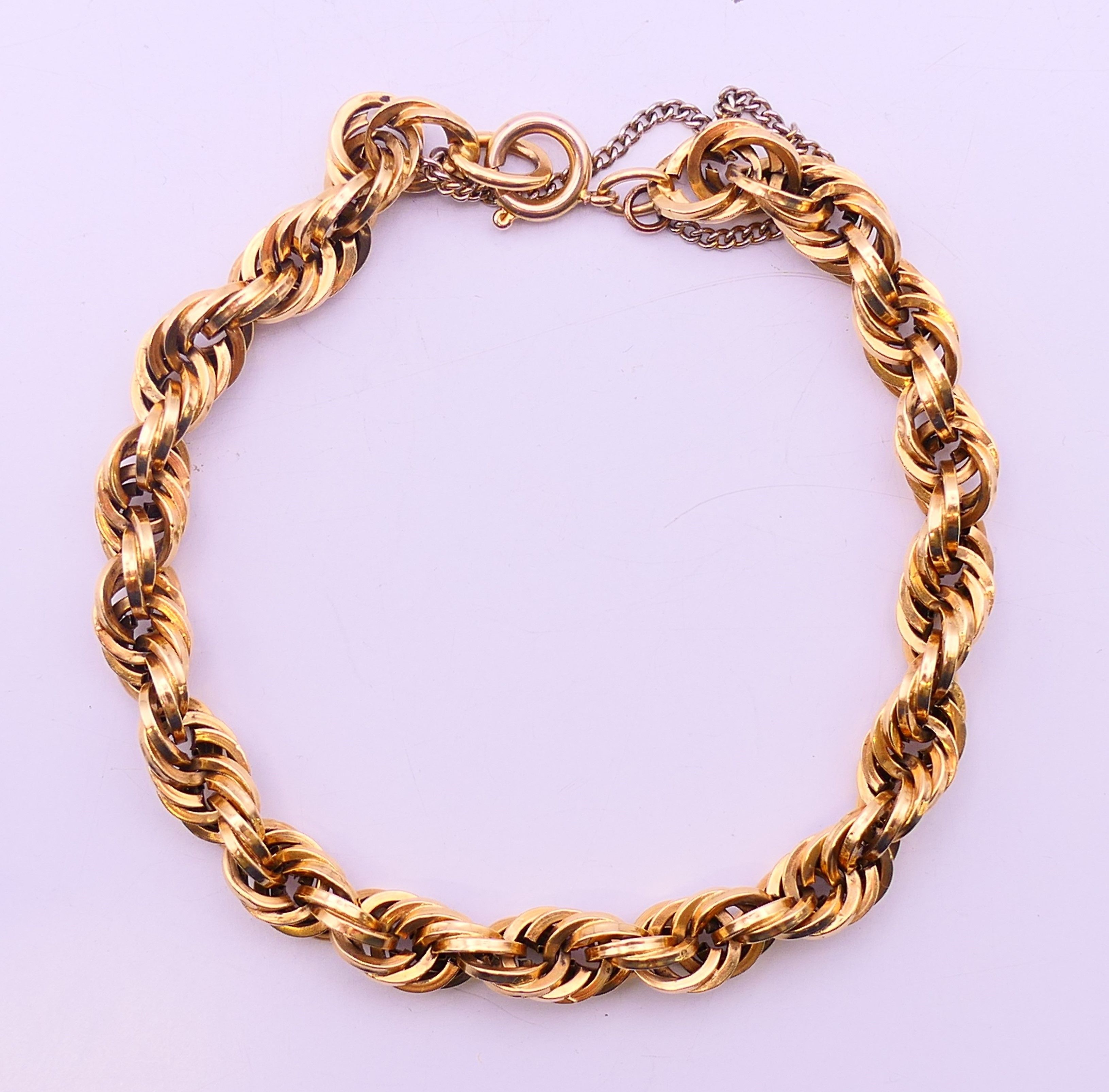 An 18 ct gold bracelet 10.1 grammes and a 9 ct gold bracelet 9 grammes. - Image 6 of 10