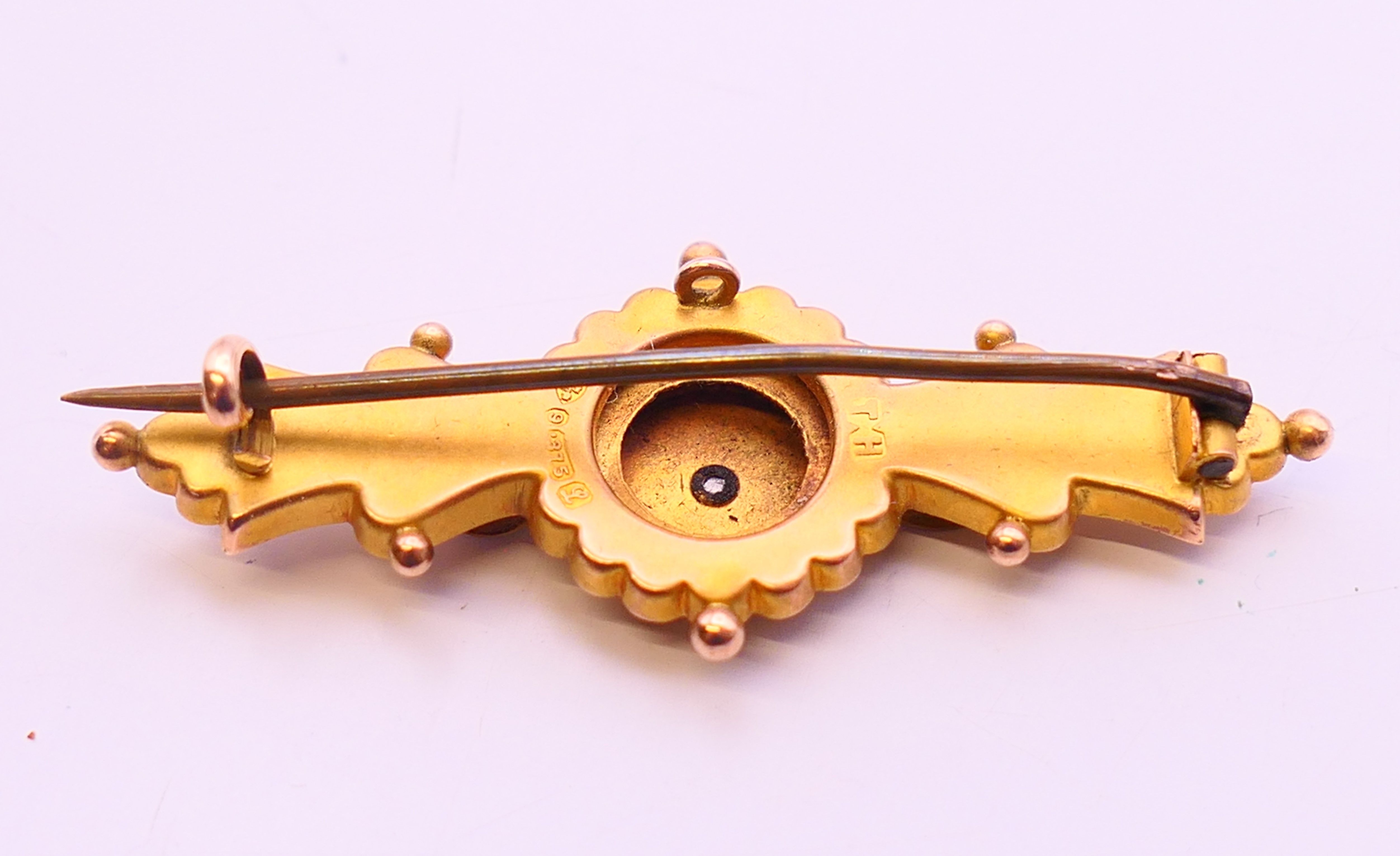 Three 9 ct gold brooches, one with pearls set within a 'D', all boxed. The largest 6 cm long. 5. - Image 8 of 14