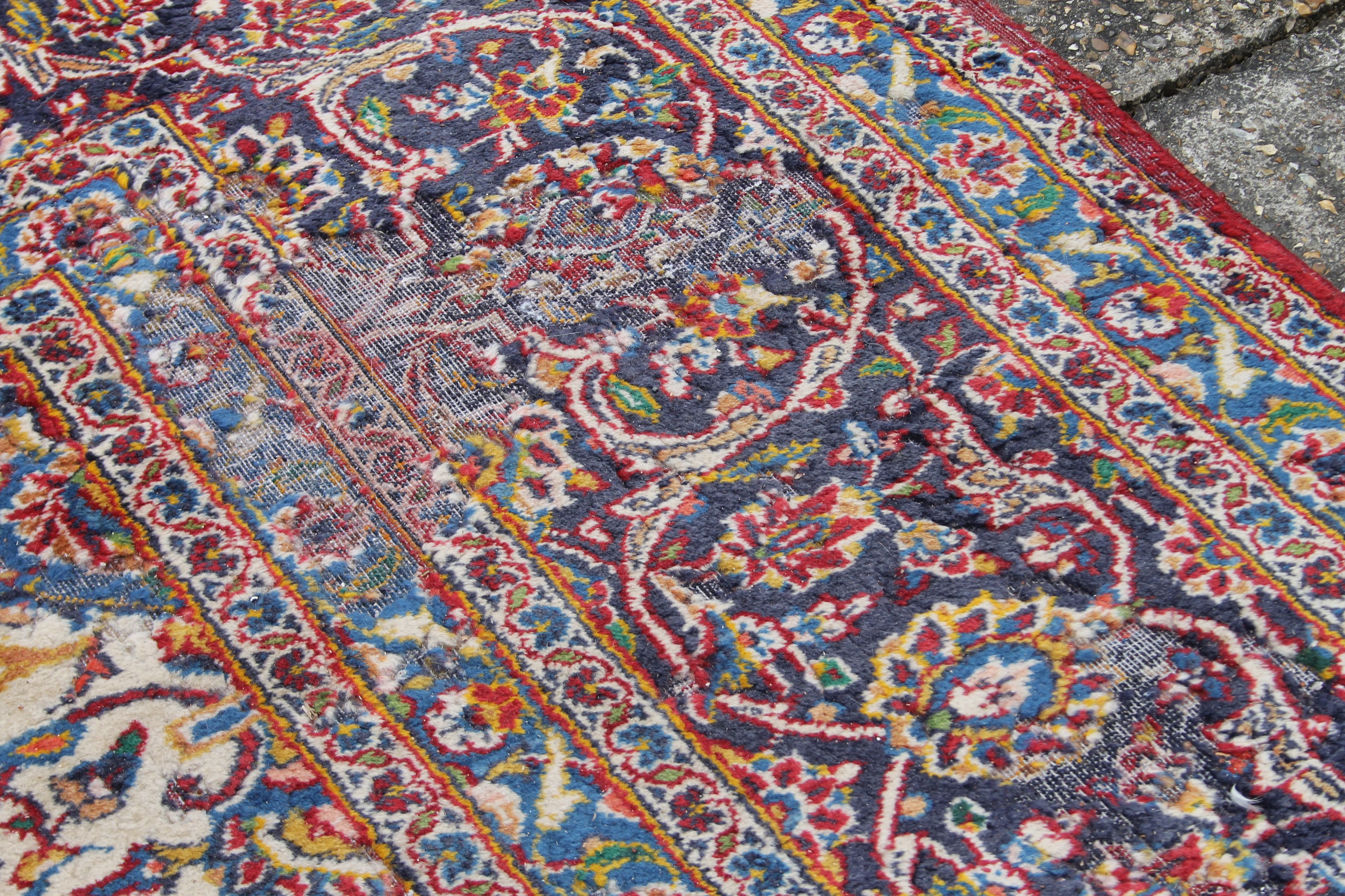 A large red ground rug. 294 x 400 cm. - Image 6 of 8