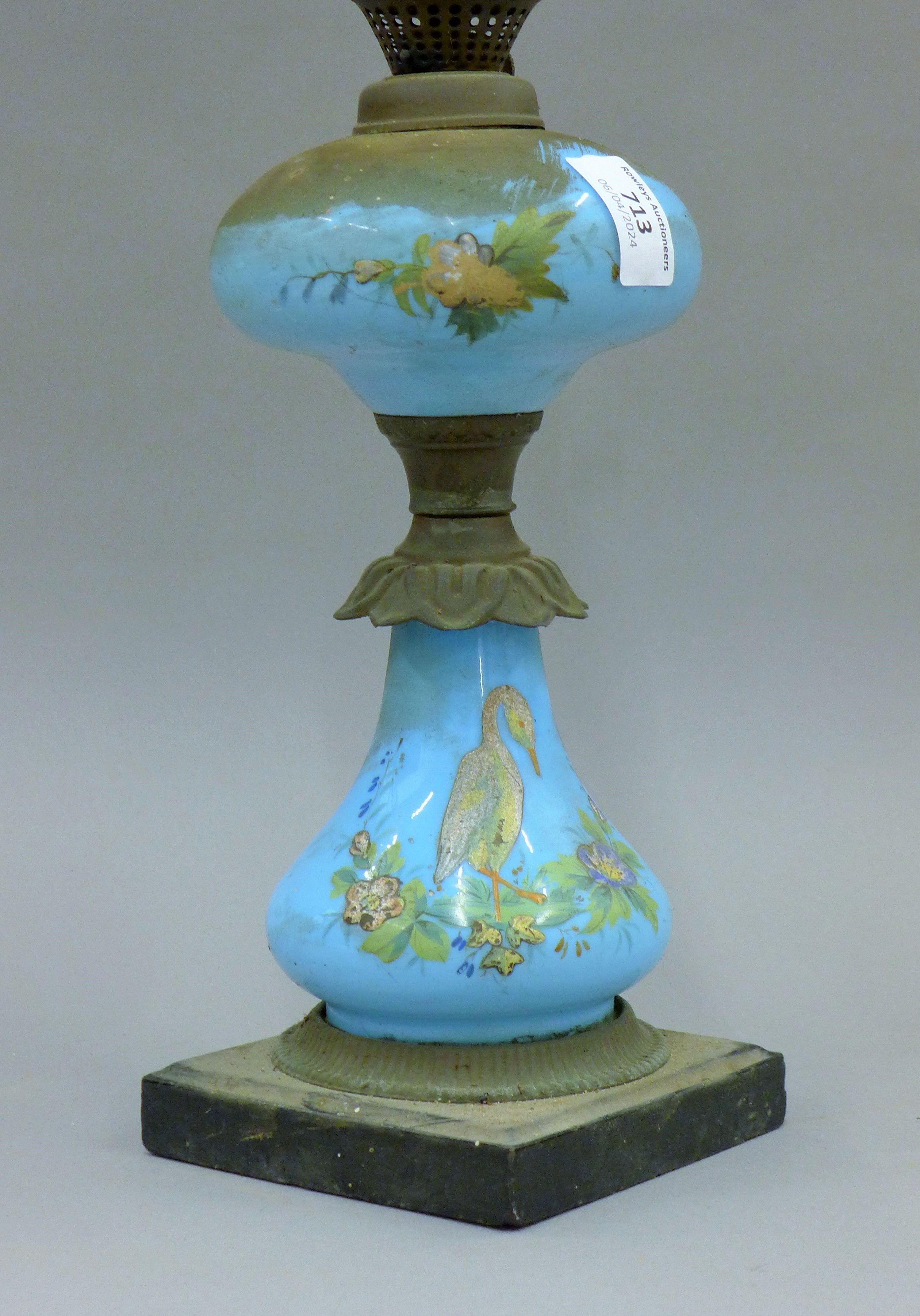 A 19th century painted blue glass oil lamp. 33 cm high excluding chimney. - Image 2 of 4