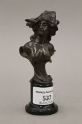 A small French Art Nouveau bronze nude bust of a female, on a hardstone base. 12.5 cm high.