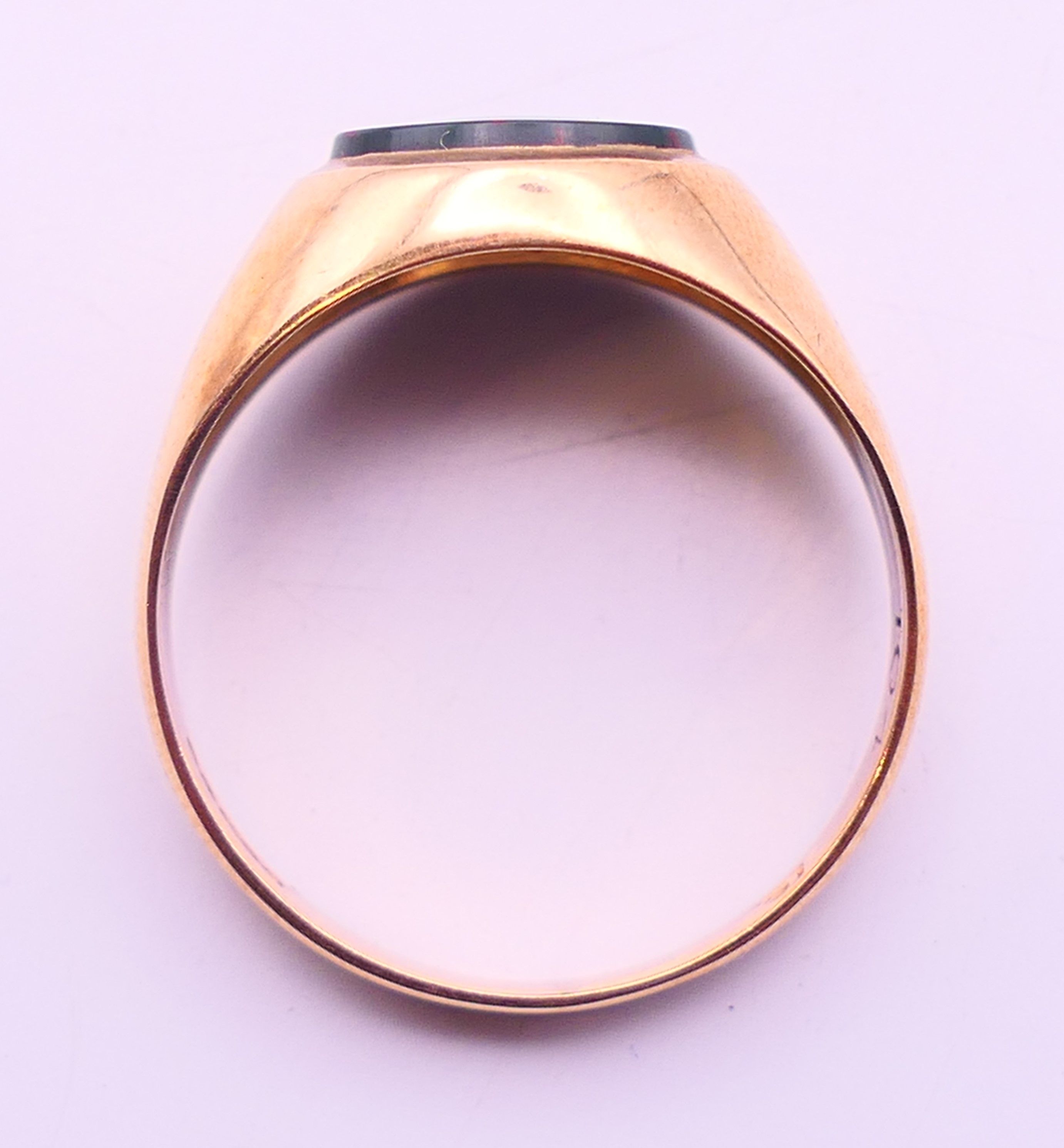 Two 9 ct gold signet rings and a 9 ct gold wedding band. 11.1 grammes total weight. - Image 13 of 13