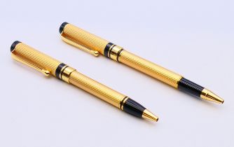 A pair of pens.