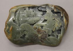 A Chinese jade boulder carving. 20 cm high.