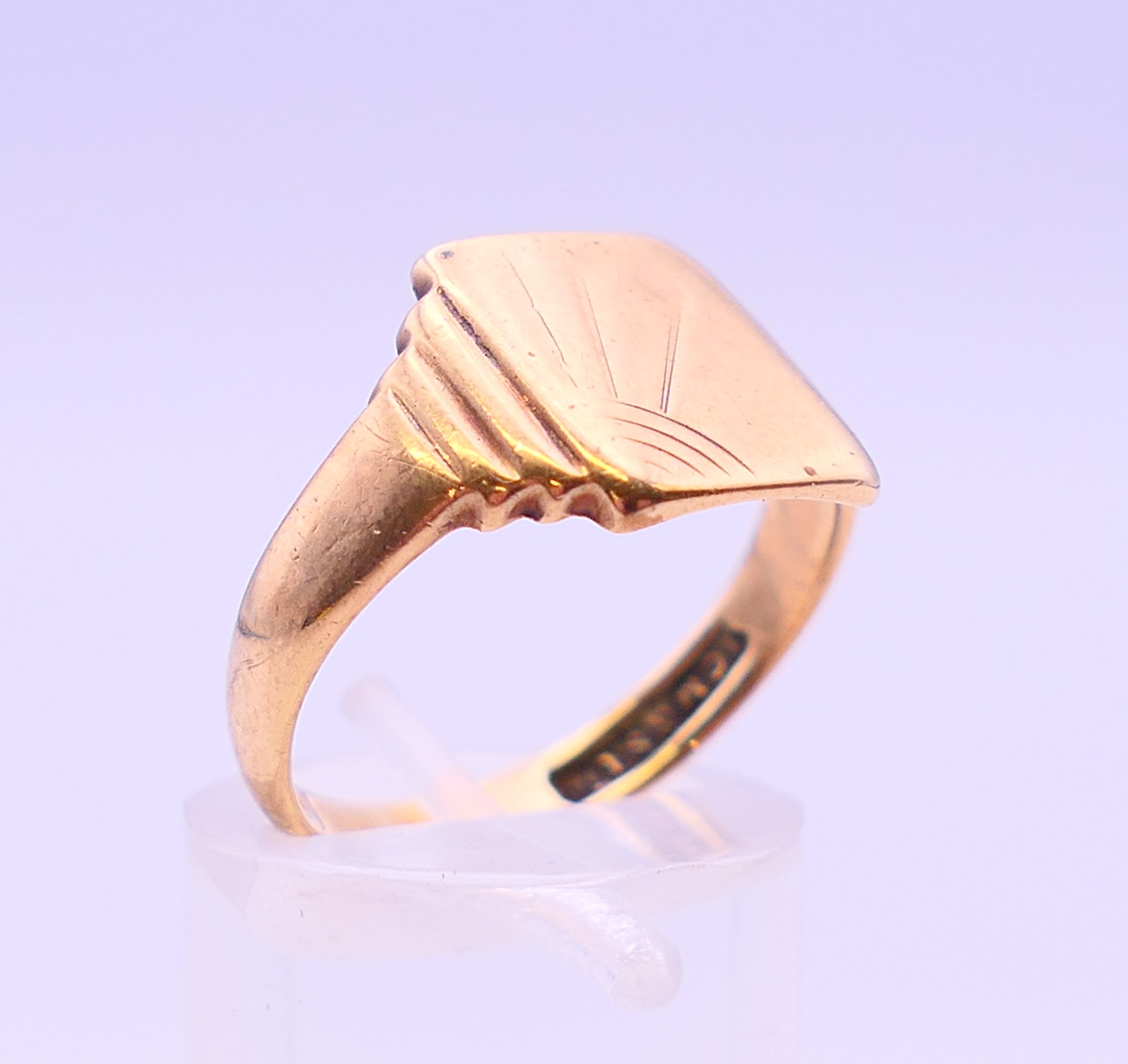 A 22 ct gold wedding band 3.8 grammes, a 9 ct gold wedding band and a 9 ct gold signet ring 8. - Image 4 of 19