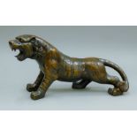 A bronze tiger. 33 cm long.