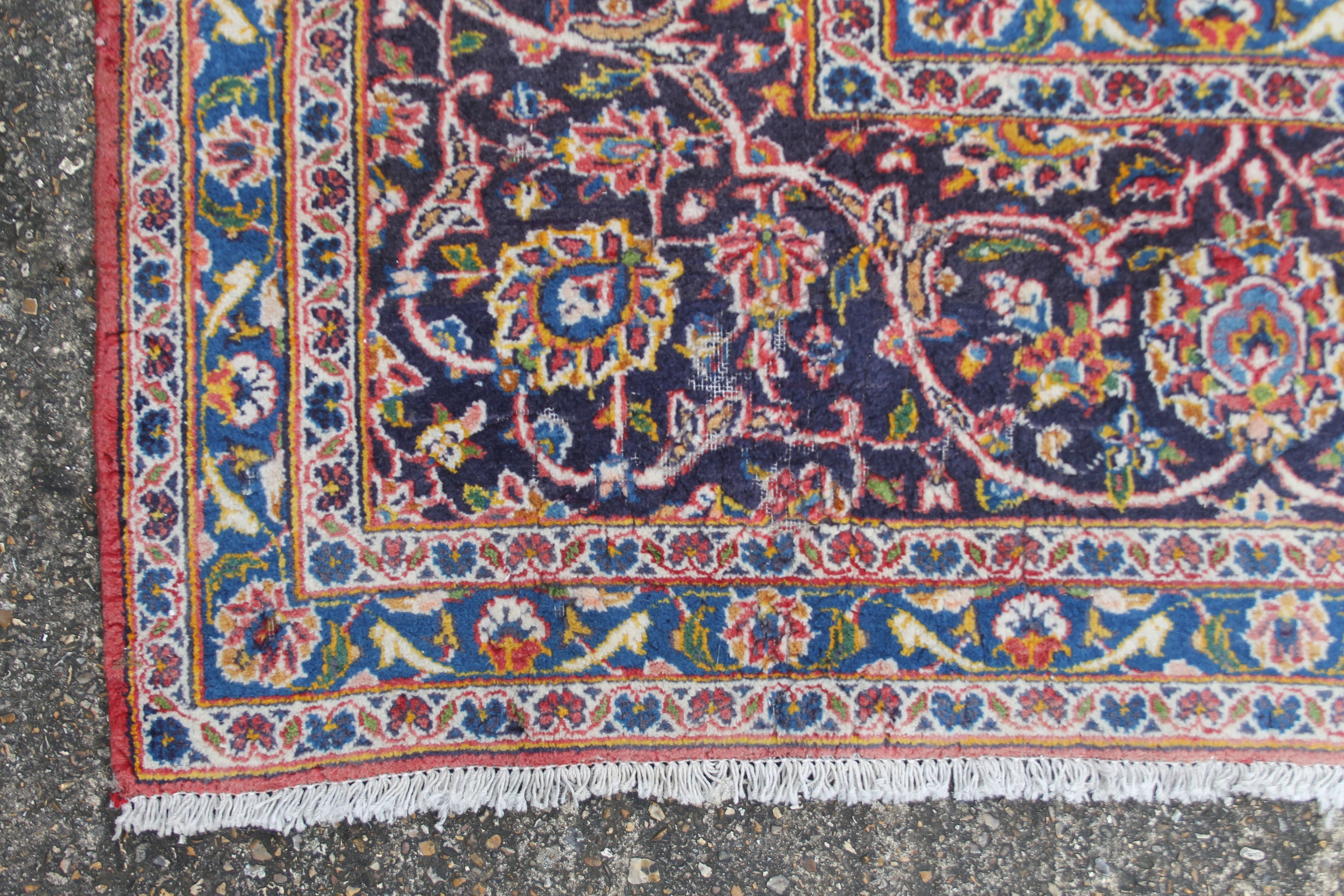 A large red ground rug. 294 x 400 cm. - Image 2 of 8