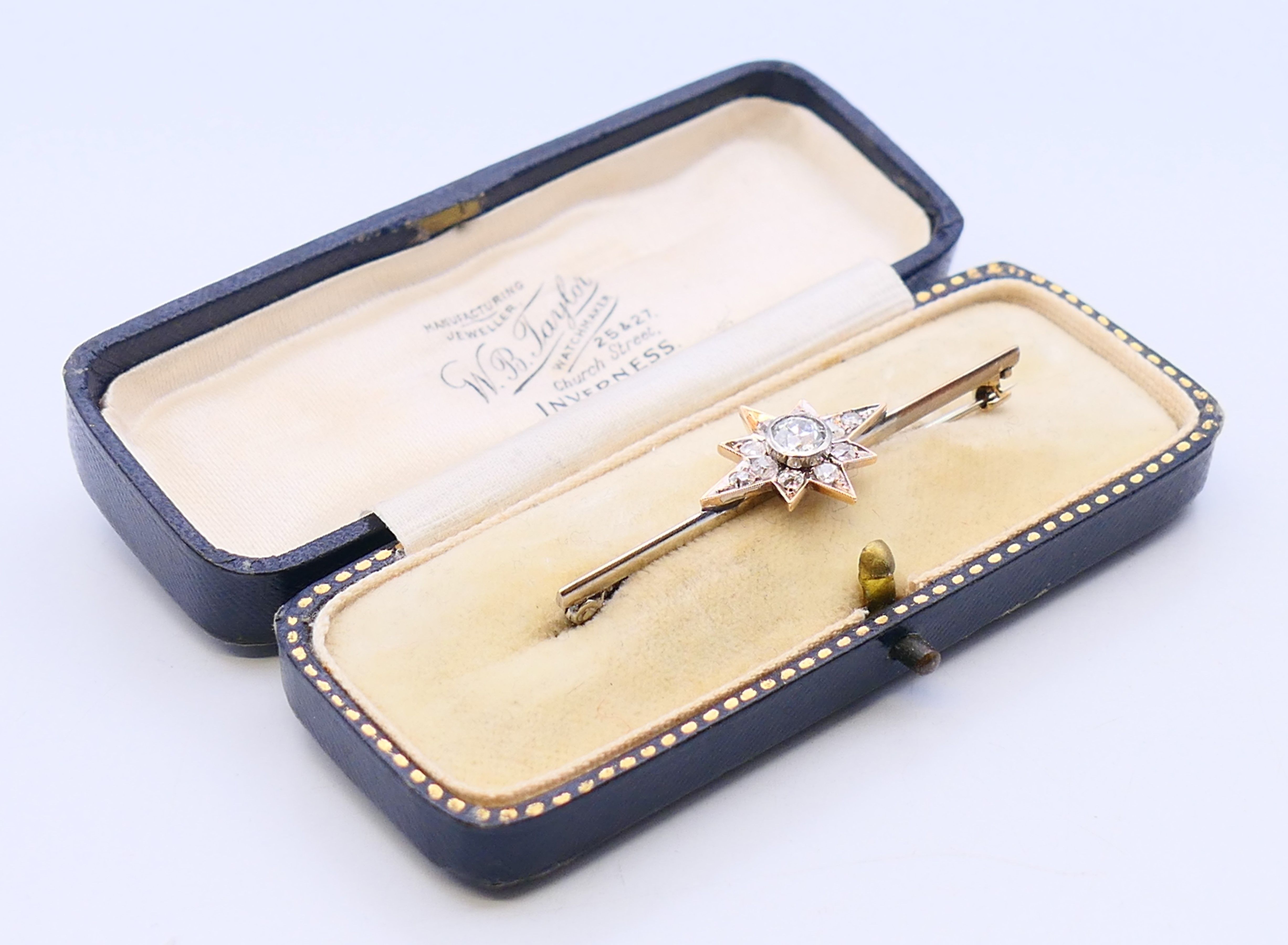 An antique bar brooch with diamond set star design, the central diamond approximately 0.5 carat. - Image 7 of 7