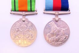 Two WWII medals - Victory and Defence.