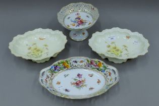 A pair of Limoges porcelain tazzas and two other Continental tazzas. The largest 13 cm high.