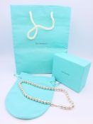A Tiffany and Co 925 silver hardware 10 mm ball necklace, with Tiffany box, jewellery pouch,