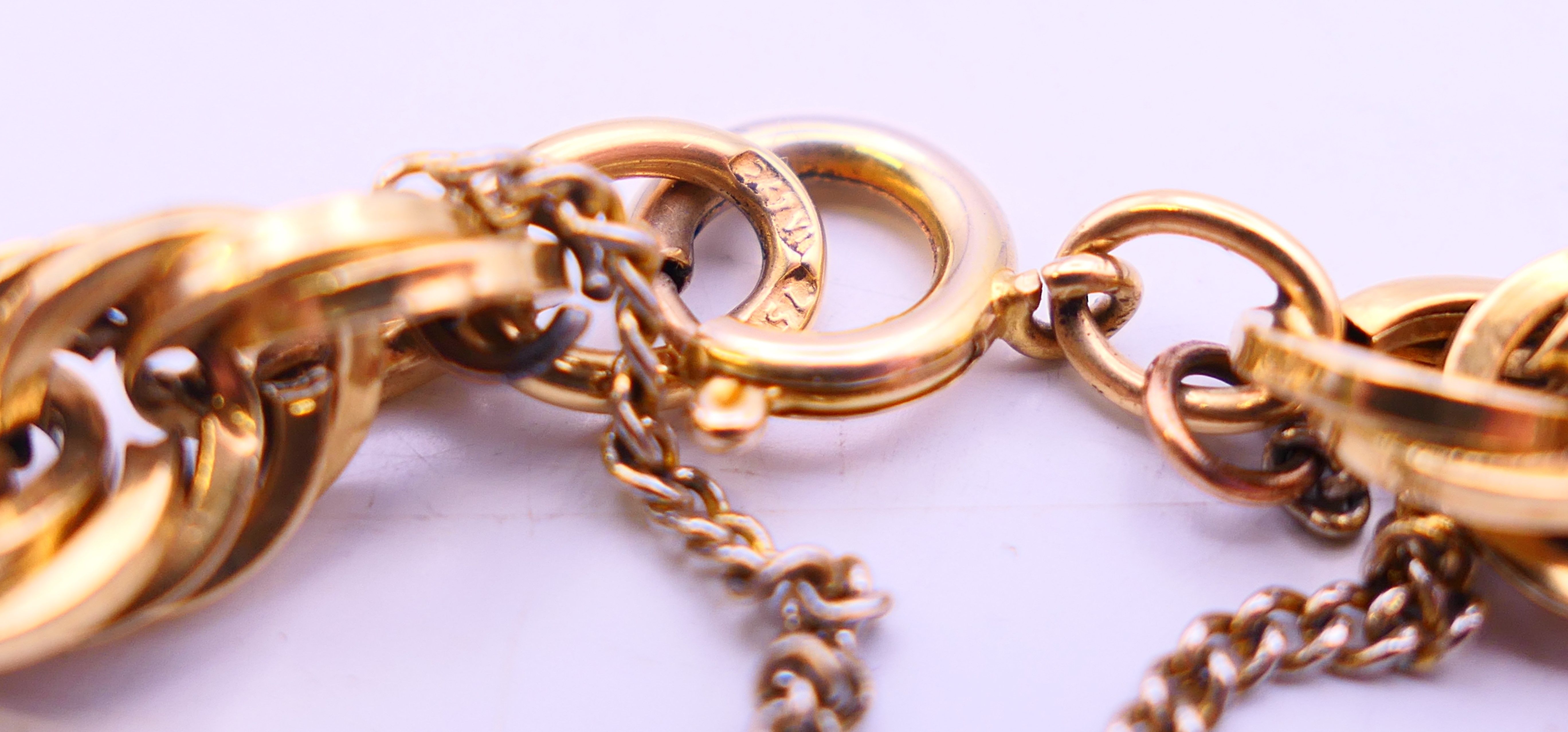 An 18 ct gold bracelet 10.1 grammes and a 9 ct gold bracelet 9 grammes. - Image 5 of 10