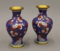 A pair of early 20th century prunus pattern cloisonne vases. 18.5 cm high.