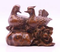 A bronze of two ducks. 5 cm high.