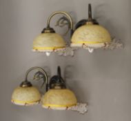 A pair of decorative twin branch wall lights. 40 cm wide.