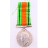 A WWII 1939-45 Defence medal. 3.75 cm diameter.