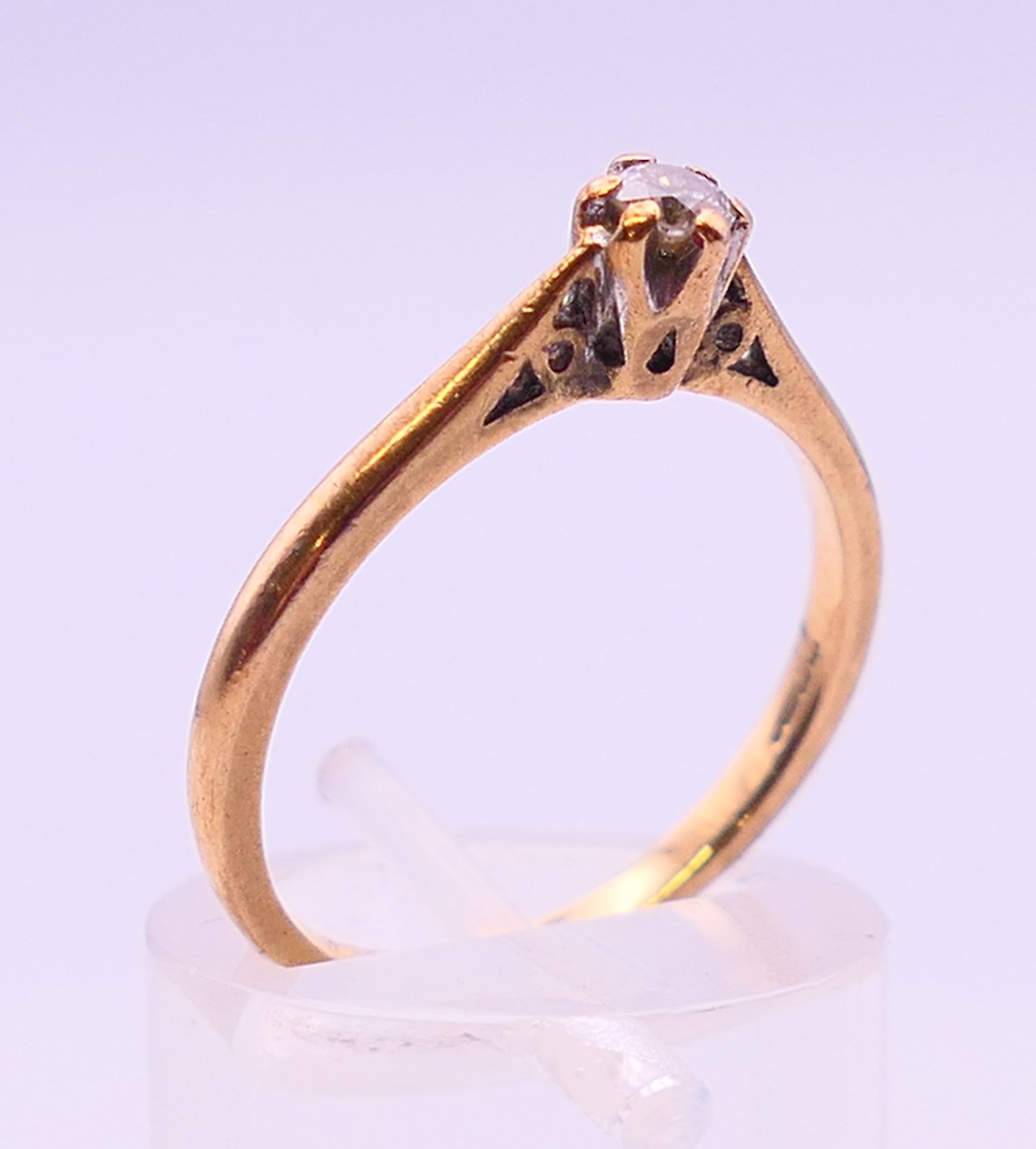 A 9 ct gold and diamond solitaire ring. Ring size O/P. - Image 3 of 7