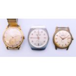 Three gentlemen's wristwatches.