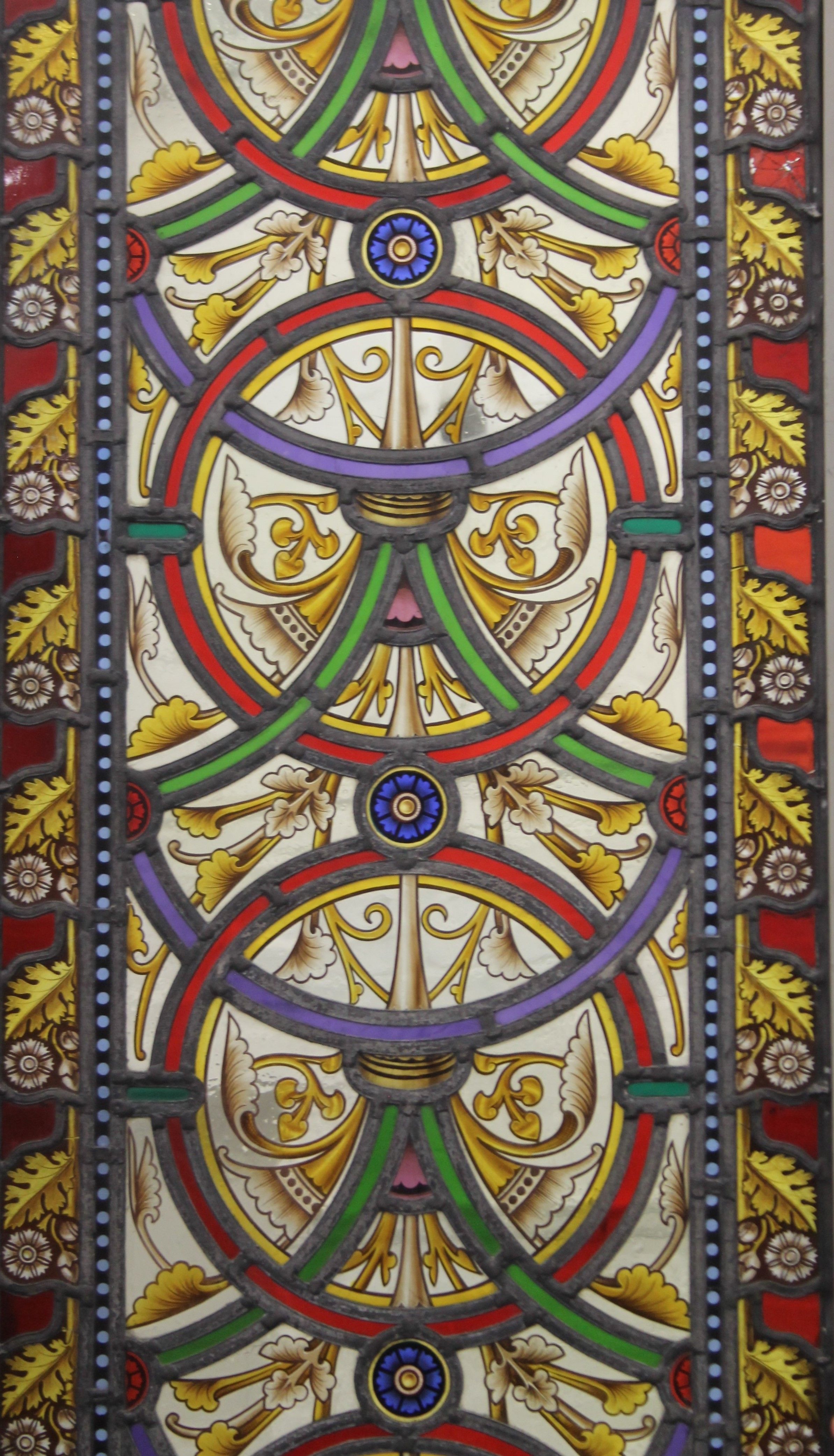 A Victorian lead glazed stained glass panel, with later frame. 51 x 112 cm. - Image 2 of 2