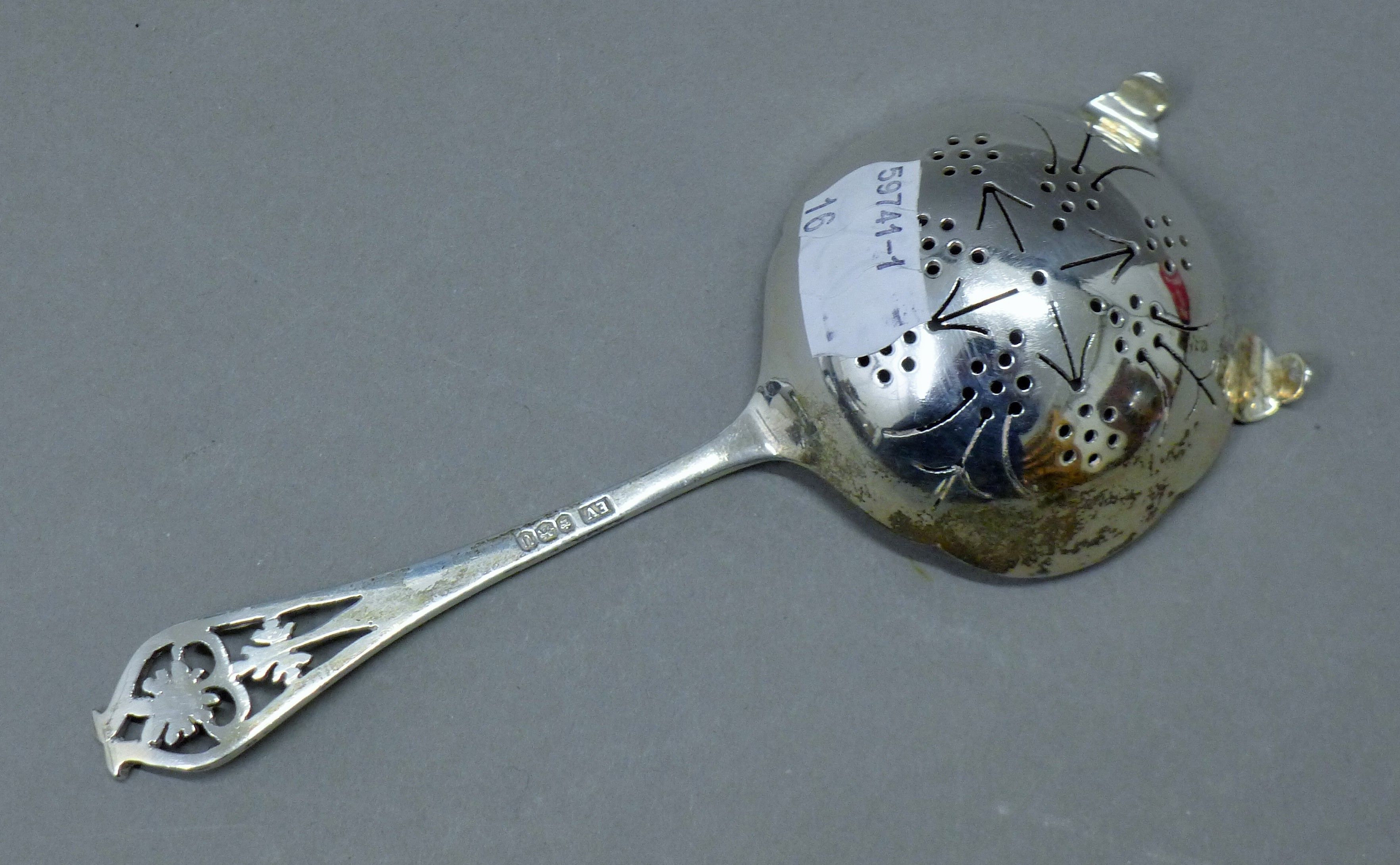A silver serving fork and a silver sifter spoon. The former 24 cm long. 181.5 grammes. - Image 6 of 7
