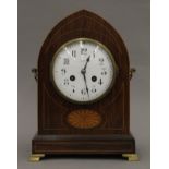 An Edwardian inlaid rosewood cased mantle clock. 30 cm high.