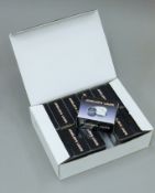 A box of jewellers' loupes.