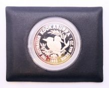 A 1993 Australian Kookaburra 1 ounce silver proof coin in wallet, privy mark in wallet.