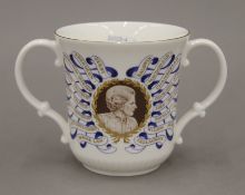 A loving cup by Royal Doulton showing Margaret Thatcher,