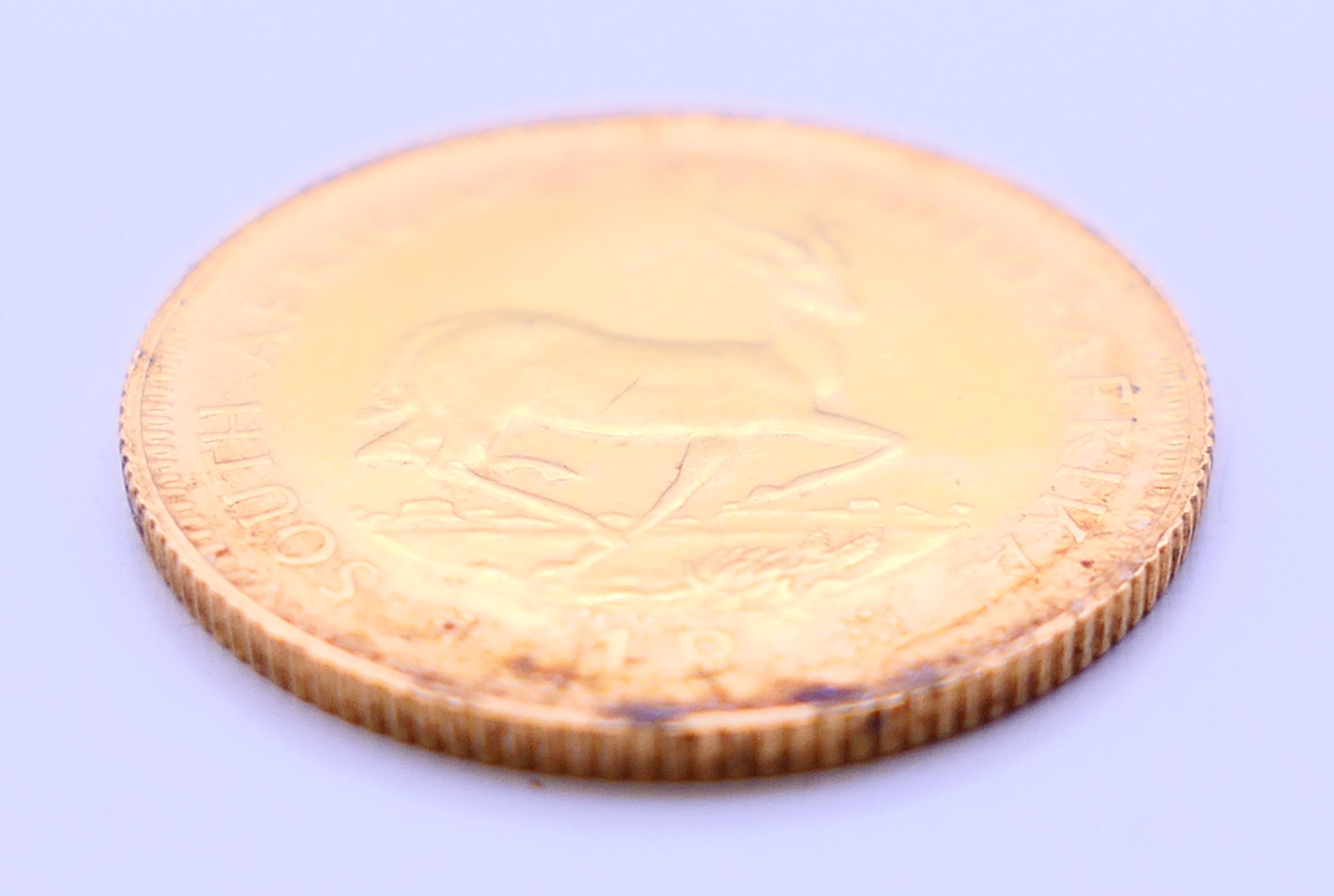 A 1967 South African 1 rand gold coin. - Image 4 of 4