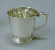 A silver Christening mug. 7 cm high. 156.8 grammes.