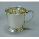 A silver Christening mug. 7 cm high. 156.8 grammes.